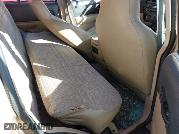 1999 Jeep Cherokee Sport with VIN 1J4FT68S7XL589206, listed as a IAAI auction lot 41411949 with 143,158 mi miles and . Bid and sale history available at DreamBid. Image 8.