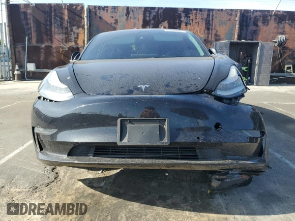 2018 Tesla Model 3 Long Range Battery z VIN 5YJ3E1EB7JF071438, wystawiony jako Copart lot #52996665 z przebiegiem 73 881 mil mil oraz Szkoda całkowita • Salvage title. Historia ofert i sprzedaży dostępna na DreamBid. Obrazek 5.