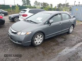2010 Honda Civic LX with VIN 2HGFA1F59AH326233, listed as a IAAI auction lot 42190935 with 61,378 mi miles and . Bid and sale history available at DreamBid. Image 2.