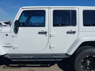 2012 Jeep Wrangler Unlimited Sahara with VIN 1C4BJWEG2CL117080, listed as a IAAI auction lot 41868590 with 92,475 mi miles. Bid and sale history available at carsss.com. Image 14.