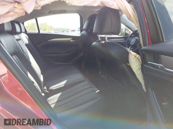 2018 Mazda 6 Grand Touring with VIN JM1GL1TY1J1302146, listed as a IAAI auction lot 41788881 with 55,852 mi miles and . Bid and sale history available at DreamBid. Image 8.