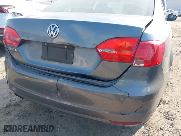 2013 Volkswagen Jetta Sedan S with VIN 3VW2K7AJ2DM318141, listed as a IAAI auction lot 41686616 with 134,294 mi miles. Bid and sale history available at carsss.com. Image 6.