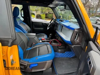 2022 Ford Bronco with VIN 1FMDE5DH4NLA79044, listed as a Copart auction lot 87172704 with 21,281 mi miles and Clean Title. Bid and sale history available at DreamBid. Image 5.