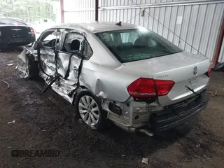 2014 Volkswagen Passat S with VIN 1VWAT7A33EC104563, listed as a IAAI auction lot 42471984 with 122,926 mi miles and . Bid and sale history available at DreamBid. Image 3.
