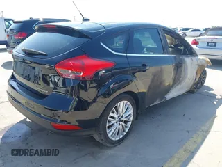 2018 Ford Focus Titanium with VIN 1FADP3N21JL289677, listed as a IAAI auction lot 42183812 with Not provided miles and . Bid and sale history available at DreamBid. Image 4.