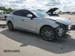 2018 Mazda 3 Touring with VIN 3MZBN1V33JM161893, listed as a Copart auction lot 56328615 with 103,827 mi miles and Salvage Title. Bid and sale history available at DreamBid. Image 4.
