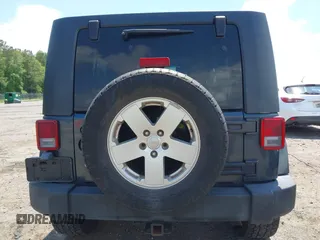 2007 Jeep Wrangler Unlimited Sahara with VIN 1J4GA59117L216687, listed as a IAAI auction lot 42188257 with 176,507 mi miles and . Bid and sale history available at DreamBid. Image 17.