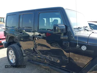 2015 Jeep Wrangler Unlimited Sahara with VIN 1C4BJWEG0FL717536, listed as a IAAI auction lot 42004096 with 90,802 mi miles and . Bid and sale history available at DreamBid. Image 13.
