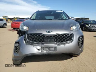 2019 Kia Sportage EX z VIN KNDPNCAC3K7547199, wystawiony jako Copart lot #53388485 z przebiegiem 74 727 mil mil oraz Szkoda całkowita • Salvage title. Historia ofert i sprzedaży dostępna na DreamBid. Obrazek 5.
