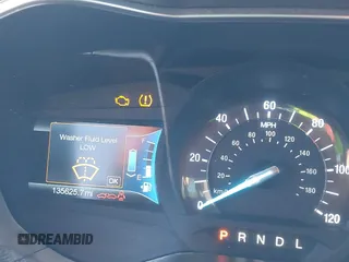 2016 Ford Fusion SE Hybrid with VIN 3FA6P0LU0GR388187, listed as a IAAI auction lot 38604646 with 135,625 mi miles. Bid and sale history available at carsss.com. Image 16.