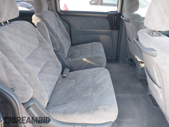 2003 Honda Odyssey EX with VIN 5FNRL18673B112958, listed as a IAAI auction lot 42172282 with 189,521 mi miles and . Bid and sale history available at DreamBid. Image 8.