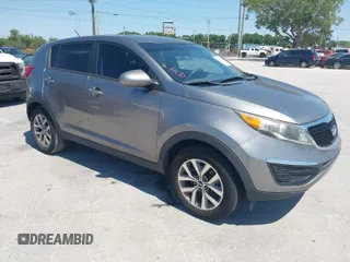 2014 Kia Sportage LX with VIN KNDPB3AC7E7595527, listed as a IAAI auction lot 42062615 with 64,777 mi miles. Bid and sale history available at carsss.com. Image 1.