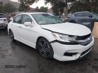 2017 Honda Accord Touring with VIN 1HGCR3F9XHA032729, listed as a IAAI auction lot 42417792 with 63,632 mi miles and . Bid and sale history available at DreamBid. Image 1.
