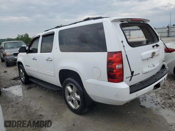 2011 Chevrolet Suburban LT with VIN 1GNSKJE3XBR392454, listed as a Copart auction lot 54828104 with 207,113 mi miles and Salvage Title. Bid and sale history available at carsss.com. Image 2.