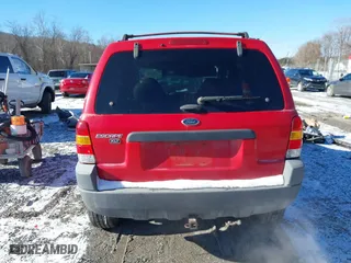 2001 Ford Escape XLT with VIN 1FMYU04131KB51488, listed as a IAAI auction lot 41363166 with 327,580 mi miles. Bid and sale history available at carsss.com. Image 16.
