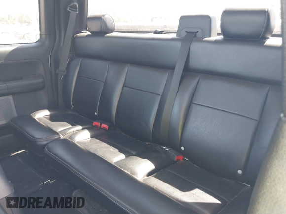 2005 Ford F-150 XLT with VIN 1FTPX14565KC84798, listed as a IAAI auction lot 42064262 with 149,534 mi miles. Bid and sale history available at carsss.com. Image 8.