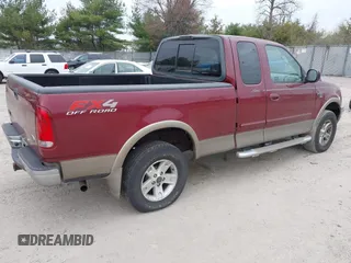 2003 Ford F-150 XL with VIN 1FTRX18L43NA96018, listed as a IAAI auction lot 41871947 with 208,517 mi miles. Bid and sale history available at carsss.com. Image 4.