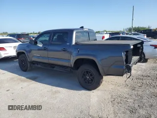 2020 Toyota Tacoma SR5 with VIN 3TMAZ5CN9LM125157, listed as a Copart auction lot 57178885 with 59,830 mi miles and Salvage title. Bid and sale history available at DreamBid. Image 2.