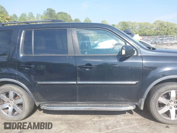 2012 Honda Pilot Touring with VIN 5FNYF4H95CB026191, listed as a IAAI auction lot 42021987 with 229,273 mi miles and . Bid and sale history available at DreamBid. Image 13.