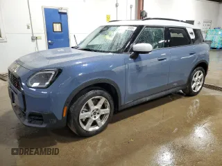 2025 MINI Countryman S with VIN WMZ23GA07S7R42869, listed as a Copart auction lot 60282695 with 5,456 mi miles and Salvage title. Bid and sale history available at DreamBid. Image 1.
