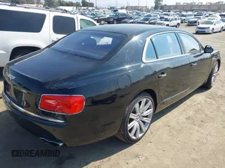 2015 Bentley Flying Spur V8 with VIN SCBET9ZA3FC042007, listed as a IAAI auction lot 40551620 with 27,039 mi miles and . Bid and sale history available at DreamBid. Image 4.