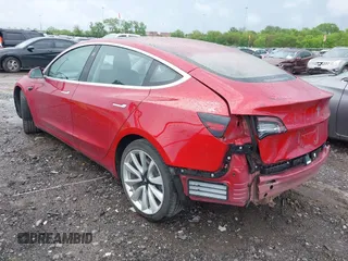 2018 Tesla Model 3 Long Range Battery with VIN 5YJ3E1EA6JF052659, listed as a IAAI auction lot 42093903 with 49,255 mi miles and . Bid and sale history available at DreamBid. Image 3.