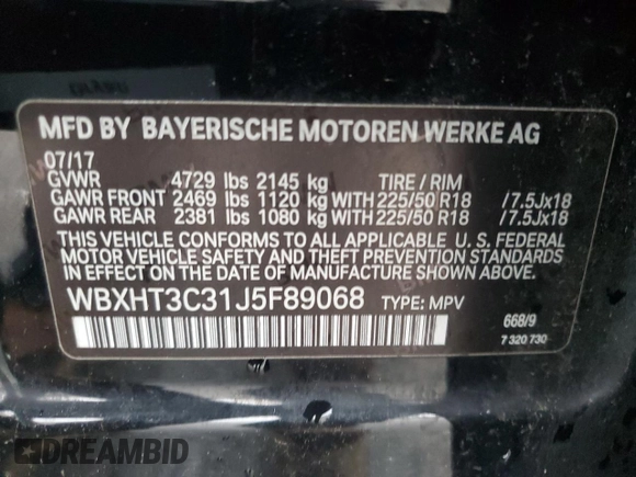 2018 BMW X1 xDrive28i with VIN WBXHT3C31J5F89068, listed as a Copart auction lot 52266655 with 145,375 mi miles and Clean Title. Bid and sale history available at carsss.com. Image 14.