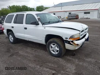 2000 Dodge Durango z VIN 1B4HS28Z4YF195702, wystawiony jako IAAI lot #42323854 z przebiegiem 218 325 mil mil oraz . Historia ofert i sprzedaży dostępna na DreamBid. Obrazek 1.