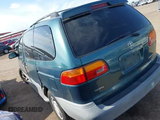 1998 Toyota Sienna LE with VIN 4T3ZF13CXWU049115, listed as a IAAI auction lot 42193159 with 194,313 mi miles and . Bid and sale history available at DreamBid. Image 3.