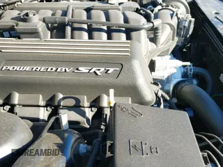 2023 Dodge Charger Scat Pack with VIN 2C3CDXGJ5PH612519, listed as a IAAI auction lot 41233789 with 13,744 mi miles and . Bid and sale history available at DreamBid. Image 19.