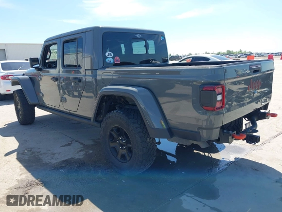 2021 Jeep Gladiator Mojave with VIN 1C6JJTEG8ML515686, listed as a IAAI auction lot 42217590 with 38,506 mi miles and . Bid and sale history available at DreamBid. Image 3.