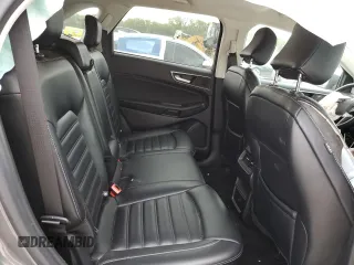 2023 Ford Edge SEL z VIN 2FMPK4J90PBA44811, wystawiony jako Copart lot #57846445 z przebiegiem 51 483 mil mil oraz Szkoda całkowita • Salvage title. Historia ofert i sprzedaży dostępna na DreamBid. Obrazek 11.