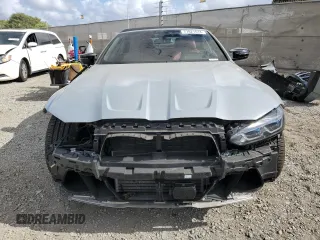2023 BMW M4 Competition xDrive with VIN WBS33BA08PCL36057, listed as a Copart auction lot 77821614 with 34,074 mi miles and Salvage Title. Bid and sale history available at carsss.com. Image 5.