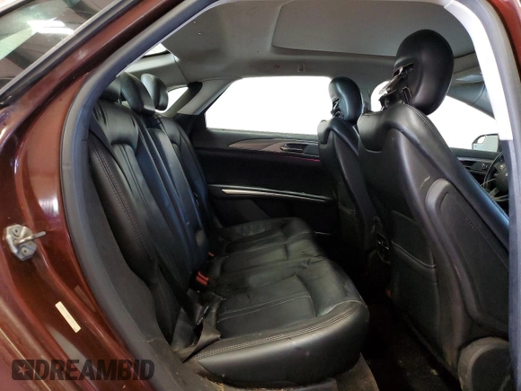 2015 Lincoln MKZ z VIN 3LN6L2J96FR600052, wystawiony jako Copart lot #56194715 z przebiegiem 259 911 mil mil oraz Szkoda całkowita • Salvage title. Historia ofert i sprzedaży dostępna na DreamBid. Obrazek 10.