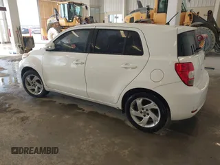 2008 Scion xD with VIN JTKKU10488J002731, listed as a IAAI auction lot 41767986 with 217,135 mi miles. Bid and sale history available at carsss.com. Image 3.
