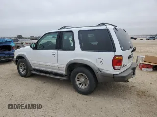 1999 Ford Explorer with VIN 1FMYU22E1XUA94061, listed as a Copart auction lot 44463165 with 172,246 mi miles and Salvage title. Bid and sale history available at DreamBid. Image 2.