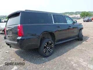 2015 Chevrolet Suburban LT with VIN 1GNSKJKC4FR222178, listed as a IAAI auction lot 42423080 with 234,870 mi miles and . Bid and sale history available at DreamBid. Image 4.