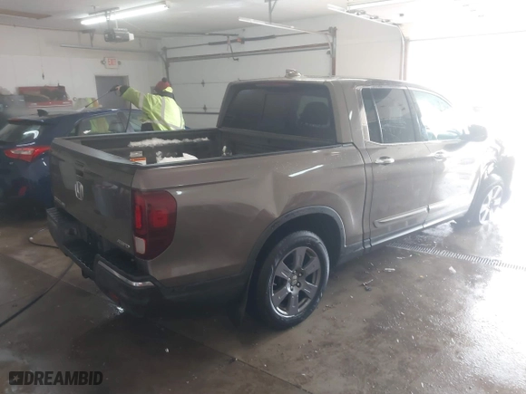 2020 Honda Ridgeline RTL-E with VIN 5FPYK3F75LB001516, listed as a IAAI auction lot 41605859 with 93,902 mi miles. Bid and sale history available at carsss.com. Image 4.