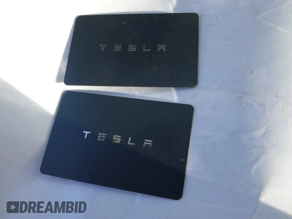 2019 Tesla Model 3 Mid Range z VIN 5YJ3E1EA0KF322776, wystawiony jako IAAI lot #41703368 z przebiegiem 131 264 mil mil oraz . Historia ofert i sprzedaży dostępna na DreamBid. Obrazek 11.
