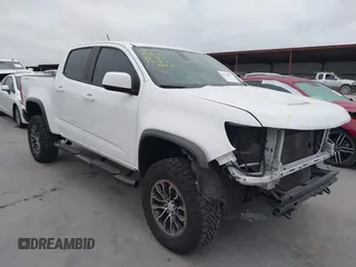 2018 Chevrolet Colorado 4WD ZR2 z VIN 1GCGTEEN1J1107593, wystawiony jako IAAI lot #41776527 z przebiegiem 74 259 mil mil oraz . Historia ofert i sprzedaży dostępna na DreamBid. Obrazek 1.