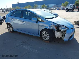 2014 Toyota Prius Plug-In with VIN JTDKN3DP1E3054710, listed as a IAAI auction lot 41421809 with 113,607 mi miles. Bid and sale history available at carsss.com. Image 1.