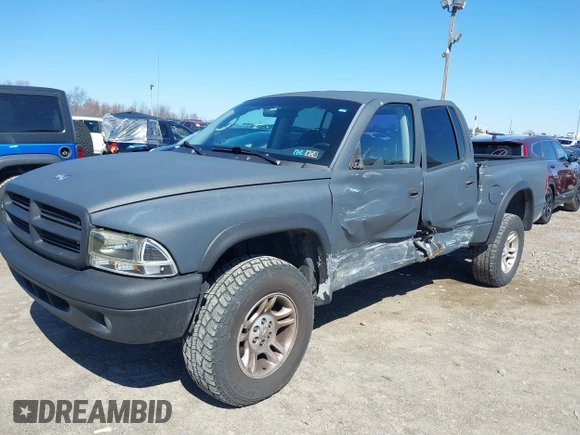 2004 Dodge Dakota Sport with VIN 1D7HG38K84S608161, listed as a IAAI auction lot 41863394 with 145,288 mi miles and . Bid and sale history available at DreamBid. Image 6.