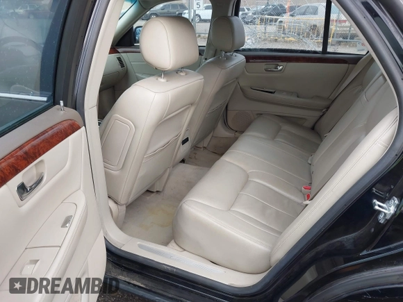 2006 Cadillac DTS w/1SC with VIN 1G6KD57Y96U251691, listed as a IAAI auction lot 41086147 with 128,959 mi miles. Bid and sale history available at carsss.com. Image 8.