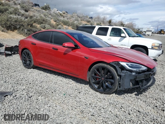 2016 Tesla Model S 90D with VIN 5YJSA1E43GF141843, listed as a Copart auction lot 51788965 with 59,744 mi miles and Salvage Title. Bid and sale history available at DreamBid. Image 4.