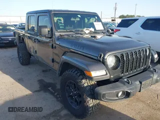 2022 Jeep Gladiator Texas Trail with VIN 1C6HJTAG7NL151184, listed as a IAAI auction lot 41614573 with 50,169 mi miles. Bid and sale history available at carsss.com. Image 1.