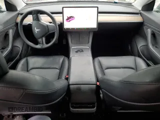 2021 Tesla Model 3 Standard Range Plus with VIN 5YJ3E1EA0MF907358, listed as a Copart auction lot 82103164 with 37,529 mi miles and Salvage Title. Bid and sale history available at DreamBid. Image 8.