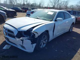 2011 Dodge Charger SE with VIN 2B3CL3CG7BH590244, listed as a IAAI auction lot 41776619 with 114,572 mi miles. Bid and sale history available at carsss.com. Image 2.