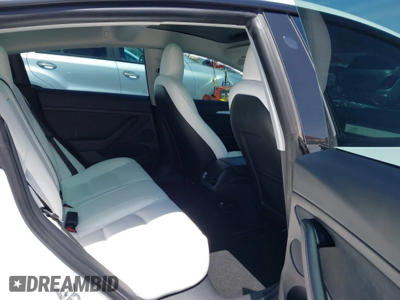 2022 Tesla Model 3 Long Range z VIN 5YJ3E1EB3NF348267, wystawiony jako IAAI lot #42323616 z przebiegiem Nie podano mil oraz . Historia ofert i sprzedaży dostępna na DreamBid. Obrazek 8.