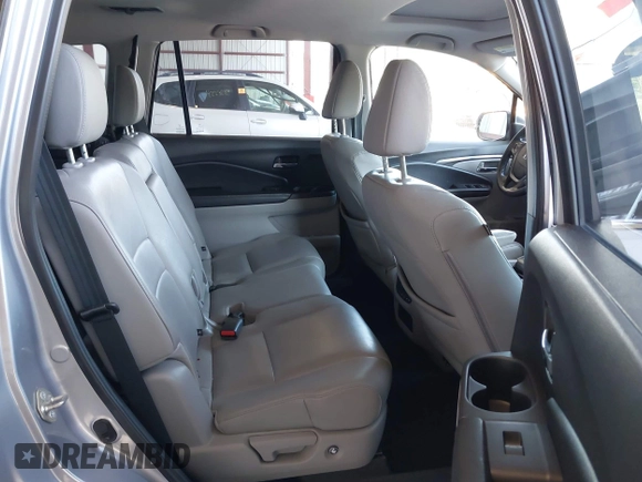2017 Honda Pilot EX-L with VIN 5FNYF6H56HB063329, listed as a IAAI auction lot 42231498 with 179,695 mi miles and . Bid and sale history available at DreamBid. Image 8.