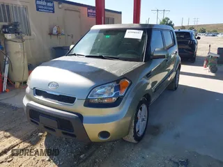 2011 Kia Soul + with VIN KNDJT2A23B7278814, listed as a IAAI auction lot 41998183 with 166,598 mi miles. Bid and sale history available at carsss.com. Image 2.